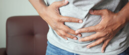young man suffering from bloating
