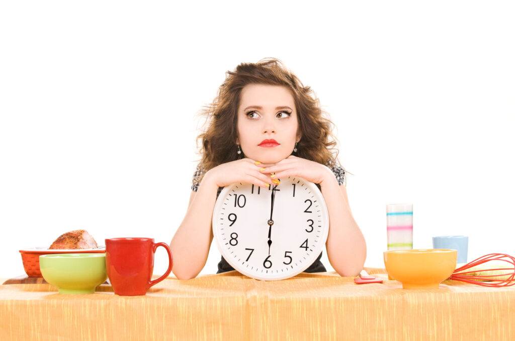 A woman waiting in the kitchen for breaking fast