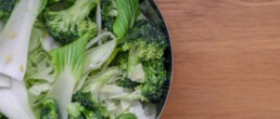 bowl with brassicas: broccoli and pak choi