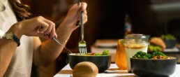 photo of person eating healthy salad