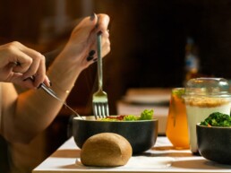 photo of person eating healthy salad